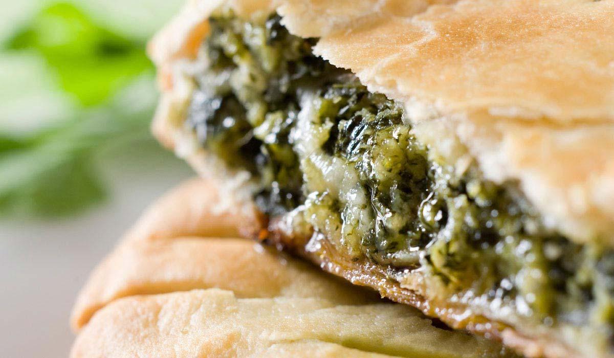 schiacciata siciliana filling with broccoli and sausage