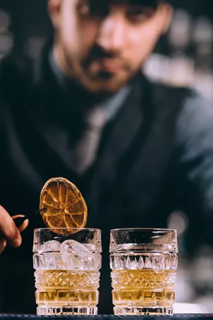 Bartender preparing a cocktail with Sanpellegrino Sparkling Mixers drinks