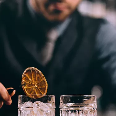 Bartender preparing a cocktail with Sanpellegrino Sparkling Mixers drinks
