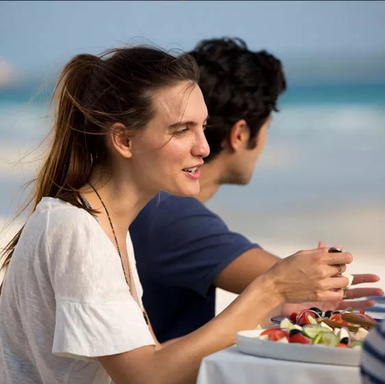 Girl Talking While Eating