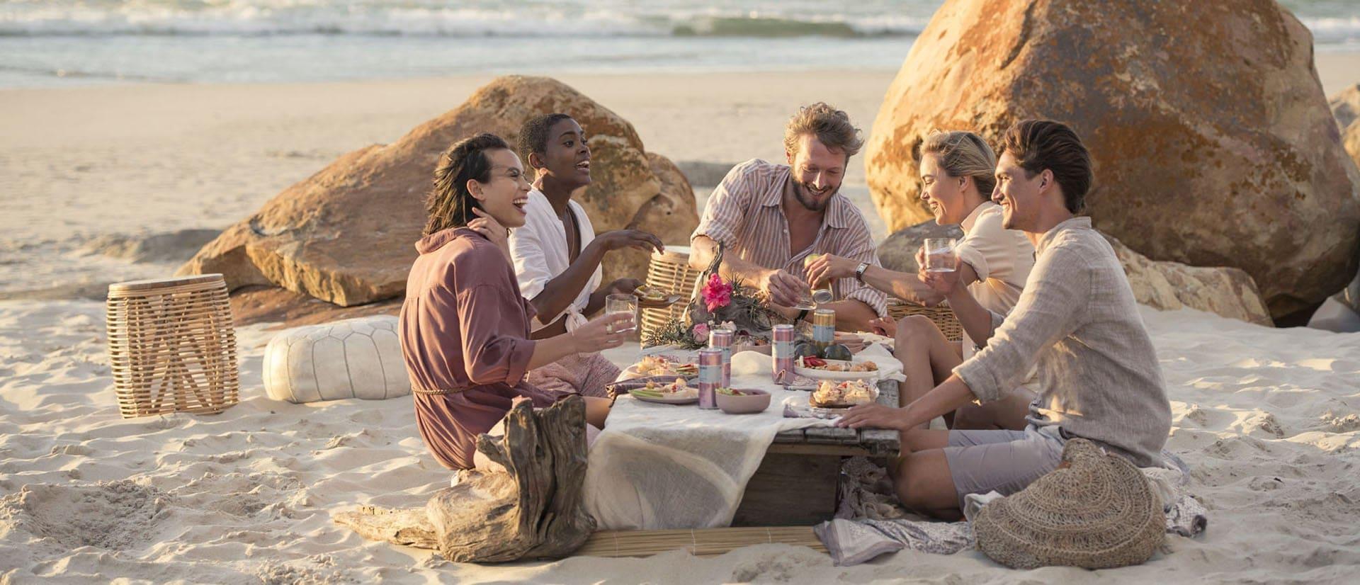 Friends Smiling During An Aperitif With Sanpellegrino Beverages