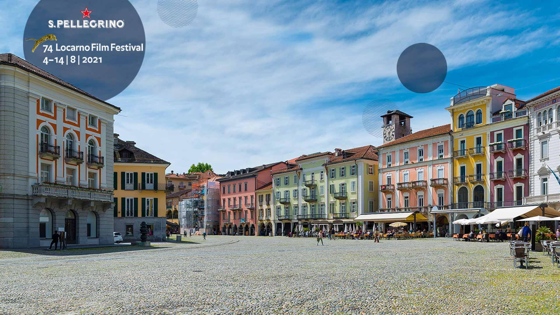Square in Locarno with colorful houses and people walking
