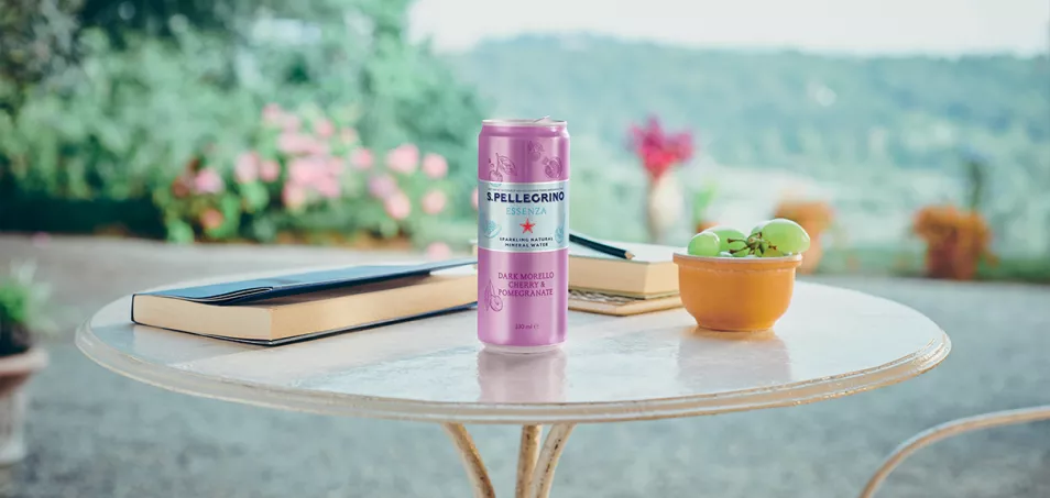 S.Pellegrino Essenza Dark Morello cherry on a table in the open air