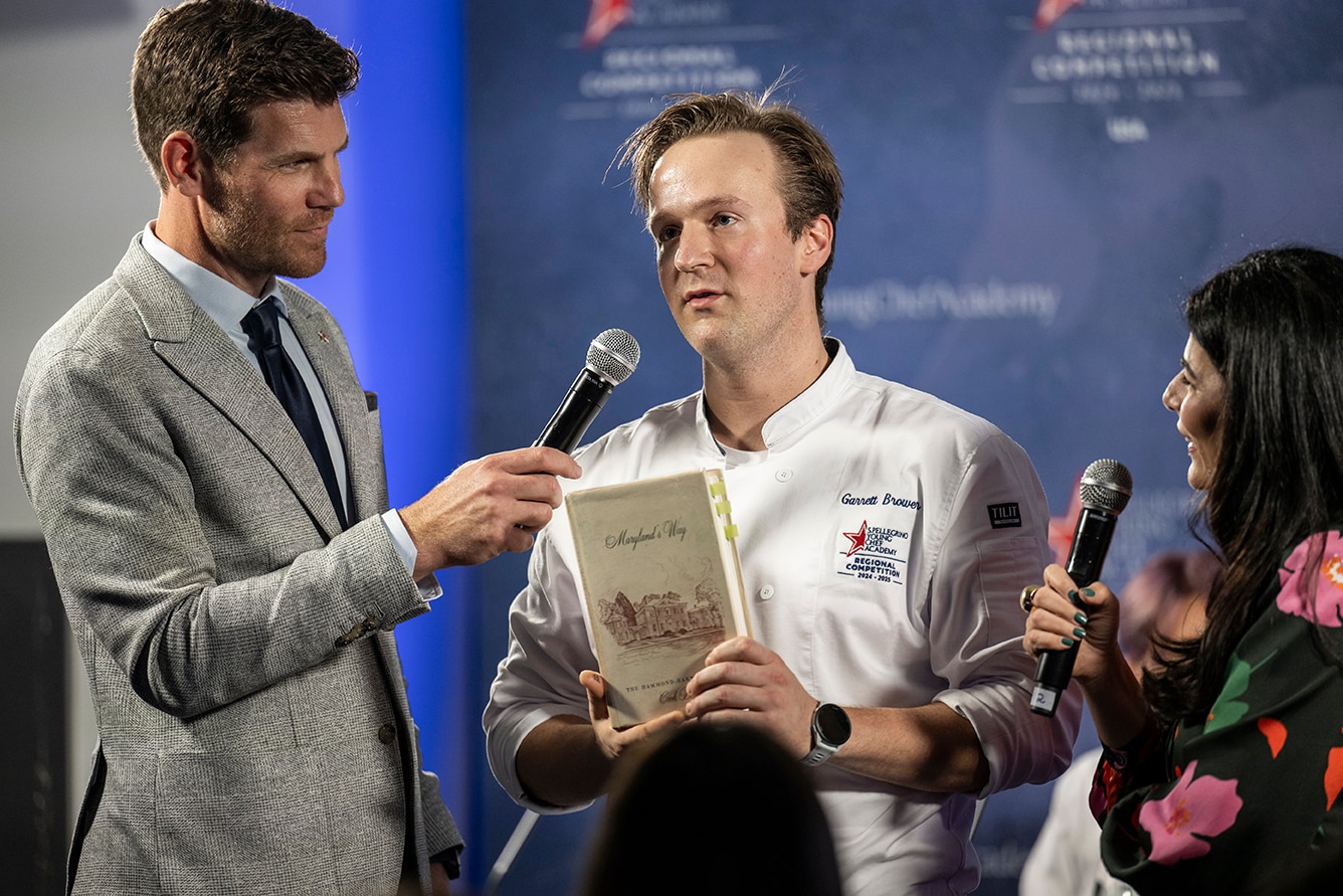 A chef is interviewed at a conference
