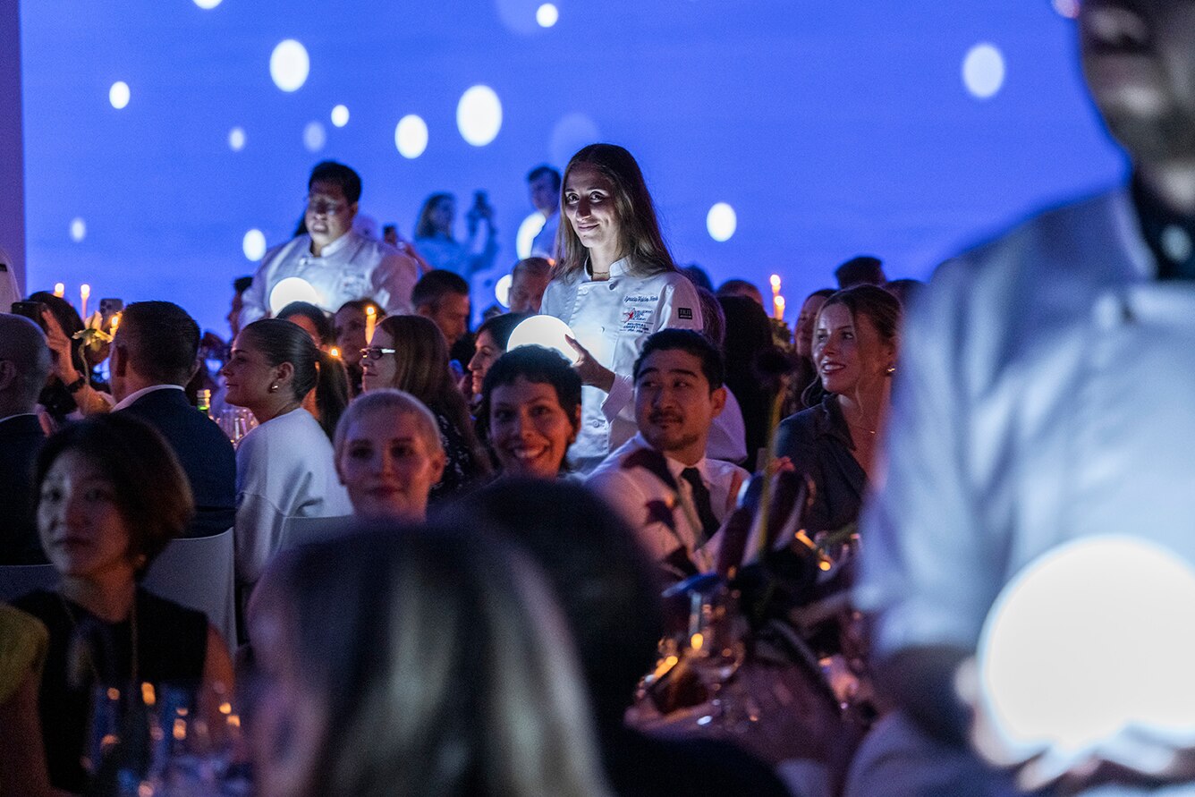 Chefs accept awards at a ceremony